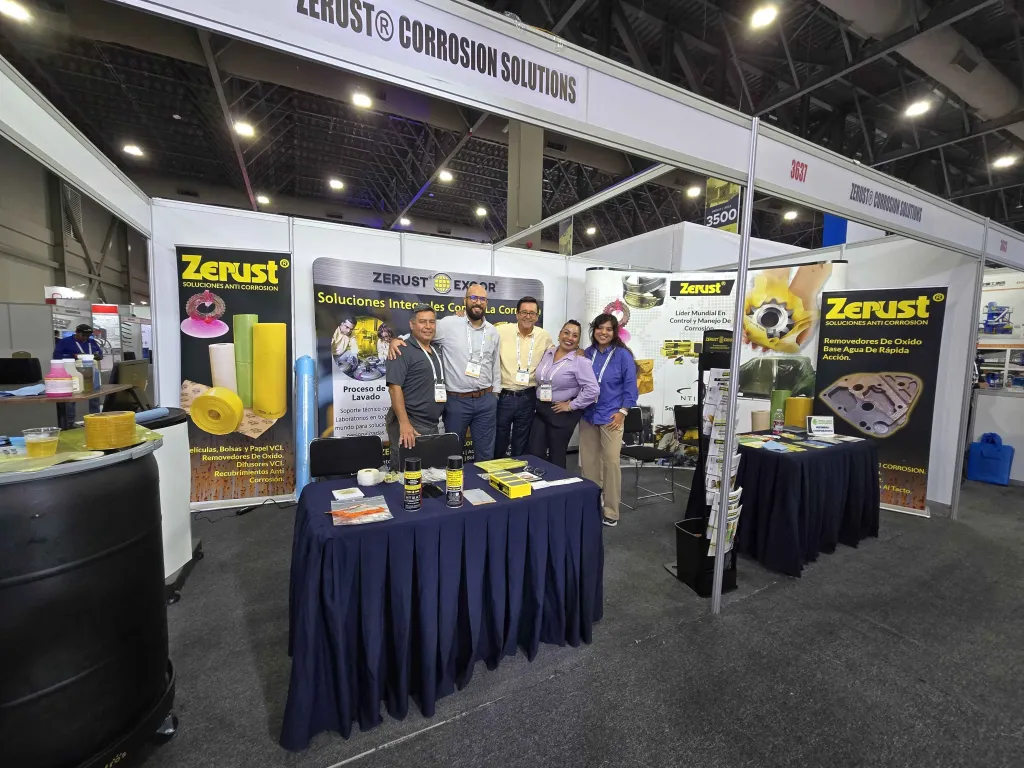 Finished Zerust tradeshow booth with team standing in the stand